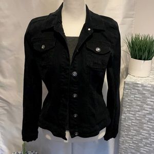 Black denim jacket with a bit of stretch. Size tag removed, fits S-M
